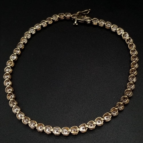 190 - A 9K Yellow Gold Diamond Tennis Bracelet. 20cm. 5.67g total weight.