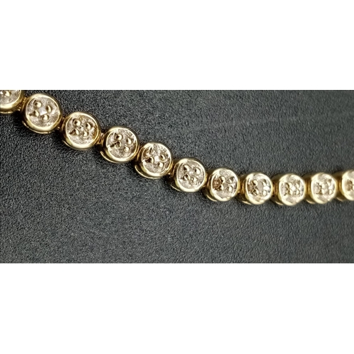 190 - A 9K Yellow Gold Diamond Tennis Bracelet. 20cm. 5.67g total weight.