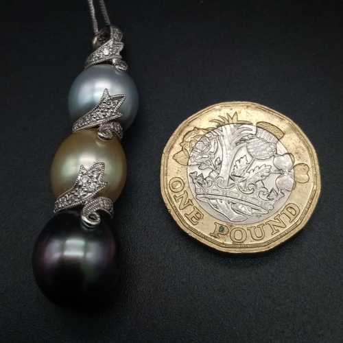 313 - A Beautiful Three-Colour South Sea Pearl and Diamond Pendant on an 18K White Gold Disappearing Neckl... 