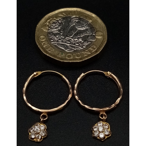 531 - 14k yellow gold hoop earrings with tiny flower CZ set hanging charms, 0.7g