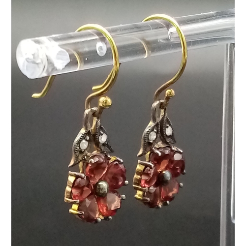 808 - A Pair of Vintage 9K Gold Garnet and Diamond Teardrop Earrings. 2.6g total weight.