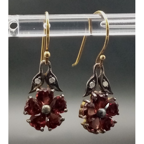 808 - A Pair of Vintage 9K Gold Garnet and Diamond Teardrop Earrings. 2.6g total weight.