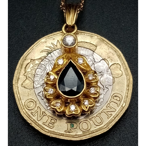 816 - An 18K Gold Sapphire and Diamond Pendant on an 18K Gold Necklace. 25mm and 42cm. 4.09g total weight