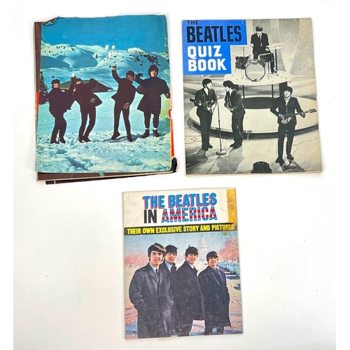 482 - A collection of three rare Beatles publications. The Beatles in America, 1964. The Beatles quiz book... 