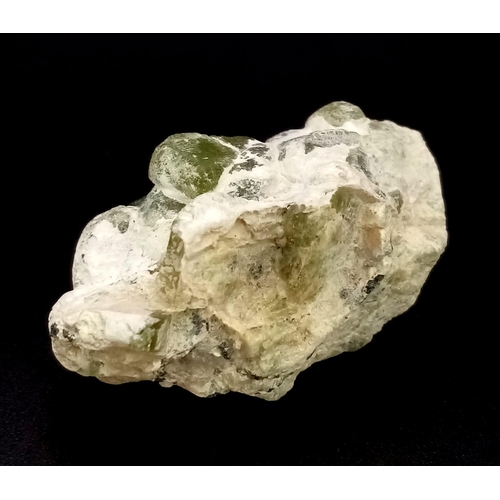 473 - A 74ct Peridot Gemstone Crystal from the Spat Mine in Manshera, Pakistan.