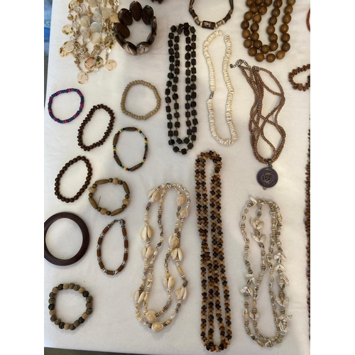 484 - Collection of jewellery in natural materials,to include wood, tapestry,faux shell, wood effect,etc. ... 