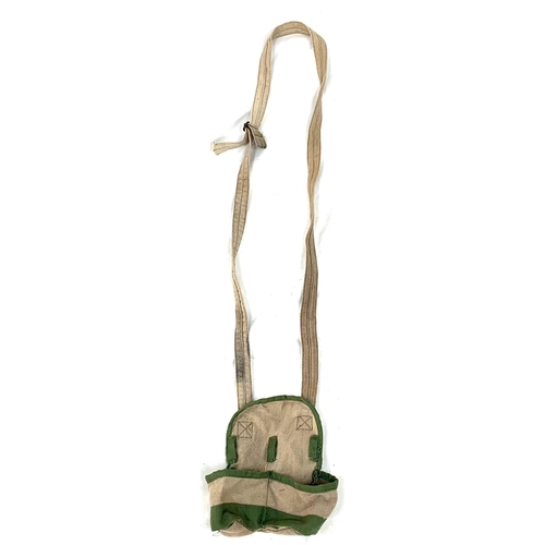 62 - Vietnam War Era N.V.A Backpack containing helmet, shirt, trousers, rice bowl, belt and cap.