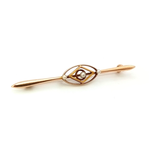 613 - An Antique 15ct Gold and Pearl Bar Brooch. 5.5cm. 2.12g total weight.