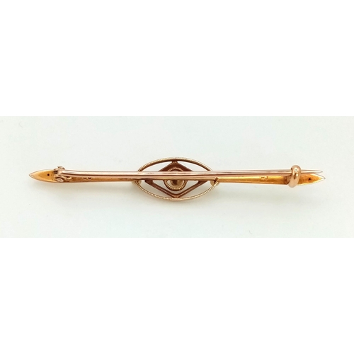 613 - An Antique 15ct Gold and Pearl Bar Brooch. 5.5cm. 2.12g total weight.