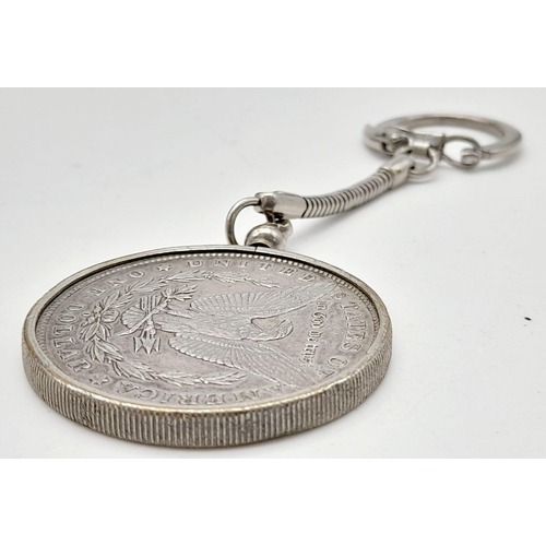 674 - A USA 1900 Silver Morgan Dollar Key-ring Fob. 34.24g. Good definition on the coin but please see pho... 