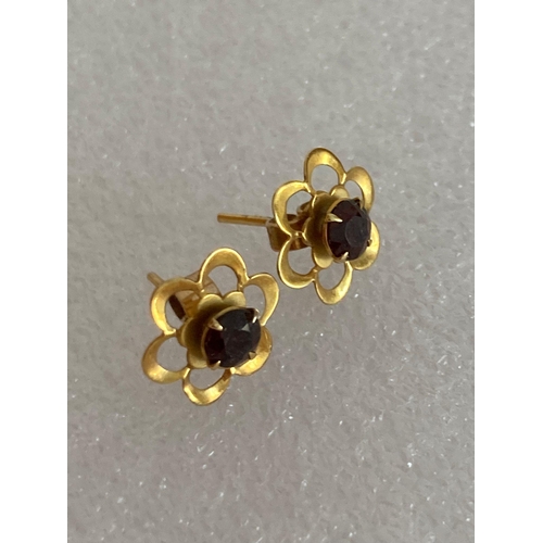 48 - Pair of hallmarked 9 carat GOLD EARRINGS set with Garnet. Complete with 9 carat gold butterfly backs... 