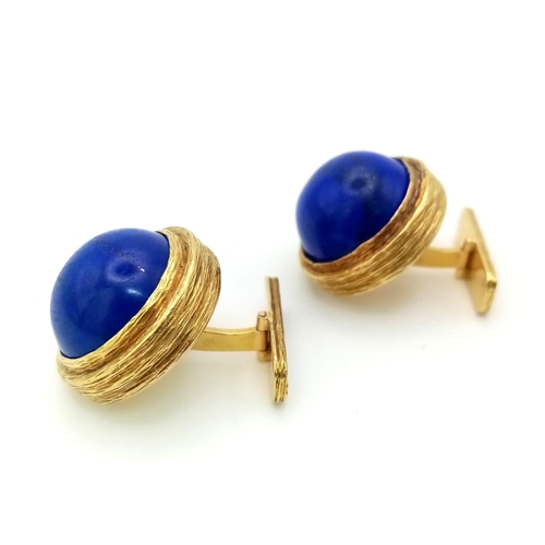 614 - A Pair of Pablo 18K Gold and Lapis Lazuli Cufflinks. Two large Afghanistan lapis cabochons set in ri... 