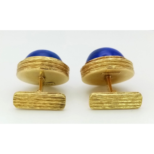 614 - A Pair of Pablo 18K Gold and Lapis Lazuli Cufflinks. Two large Afghanistan lapis cabochons set in ri... 