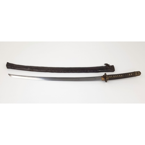 90 - WW2 Captured Japanese Officers Sword. With nicely marked tang and family blade. This was a
certified... 