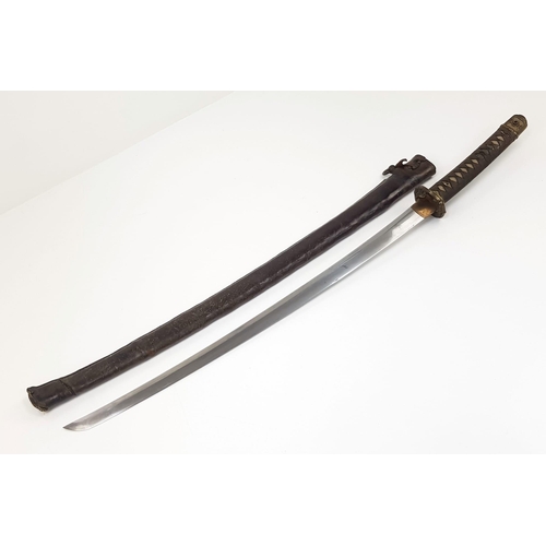 90 - WW2 Captured Japanese Officers Sword. With nicely marked tang and family blade. This was a
certified... 