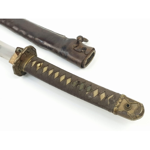 90 - WW2 Captured Japanese Officers Sword. With nicely marked tang and family blade. This was a
certified... 