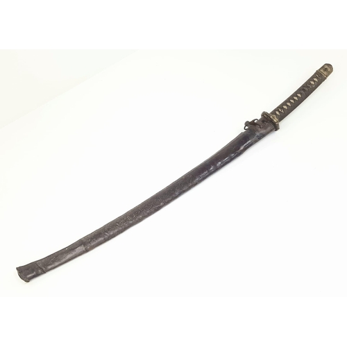 90 - WW2 Captured Japanese Officers Sword. With nicely marked tang and family blade. This was a
certified... 