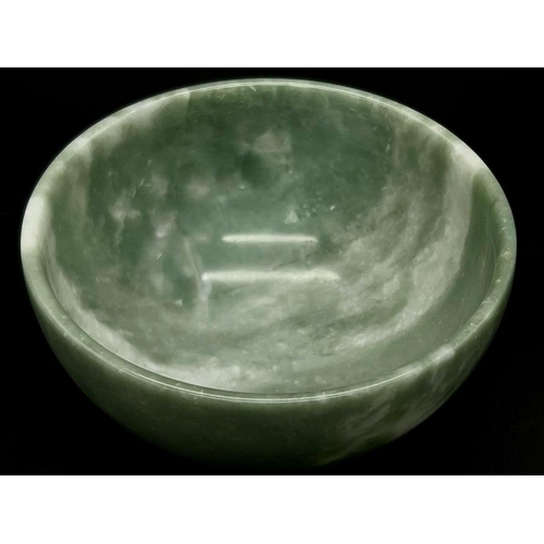 1294 - A Small Chinese Jade Bowl. Perfect as a bonbon dish or ornament. 10cm diameter.