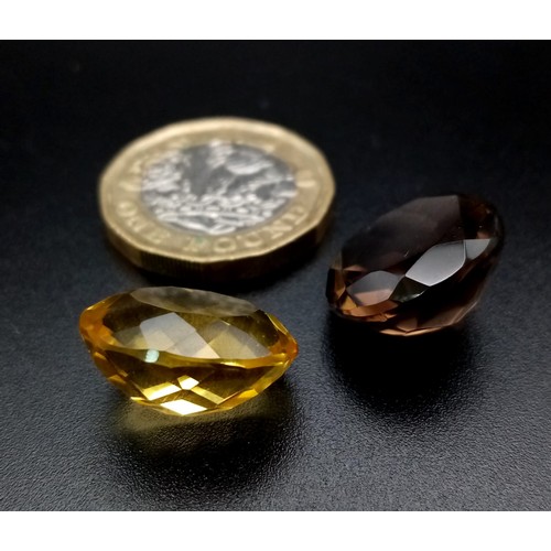 585 - A 12ct Oval-Cut Lemon and a 14ct Round-Cut Smoky Quartz Gemstone. No certificates so a/f.