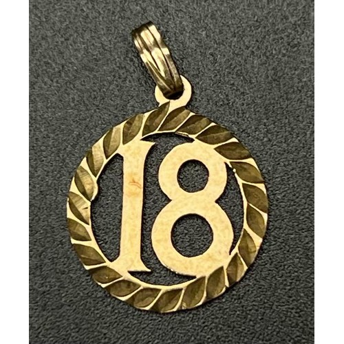 661 - A 9K Gold 18 Pendant. 25mm. 1.11g