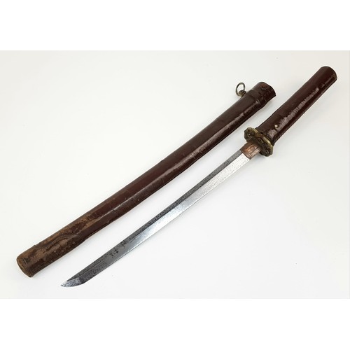 76 - WW2 Japanese Wakikashi Short Sword with an ancient family blade and crest on the Habaki. The
Wakizas... 