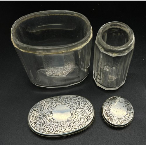 668 - Two Victorian Glass and 925 Silver Lidded Containers. Circular and oval. Hallmarks for London 1876. ... 