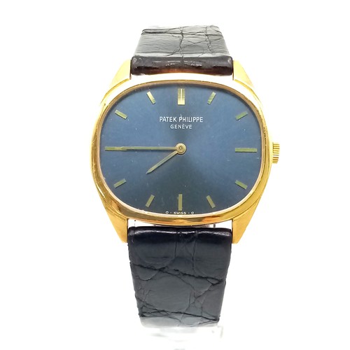 85 - A Vintage Patek Philiippe 18K Gold Watch. Black leather strap - 18k gold buckle. 18k gold case - 32m... 