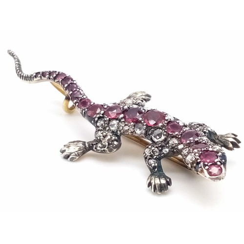 250 - A Rare Victorian Ruby and Diamond High-Karat Salamander Brooch. Vibrant rubies and diamonds set in s... 