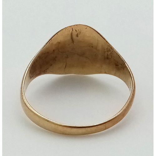 540 - A Vintage 9K Yellow Gold Child's Signet Ring. Size G. 1.15g