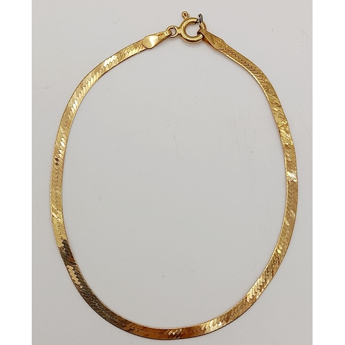 647 - A 9K Yellow Gold Herringbone Bracelet. 18cm. 1.73g