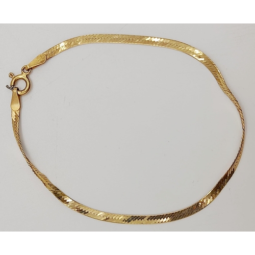 647 - A 9K Yellow Gold Herringbone Bracelet. 18cm. 1.73g