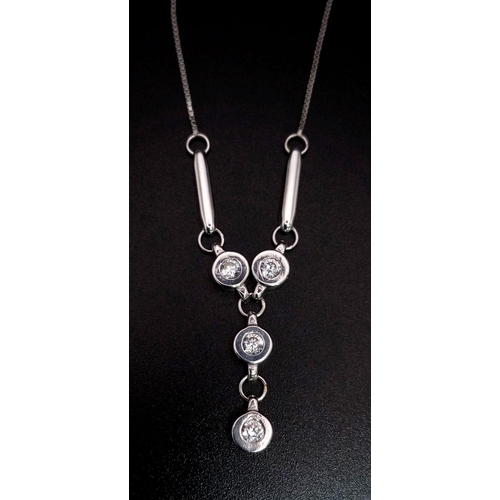 652 - 18K WHITE GOLD STONE SET NECKLACE 5.7G