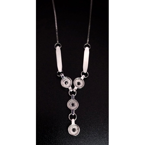 652 - 18K WHITE GOLD STONE SET NECKLACE 5.7G