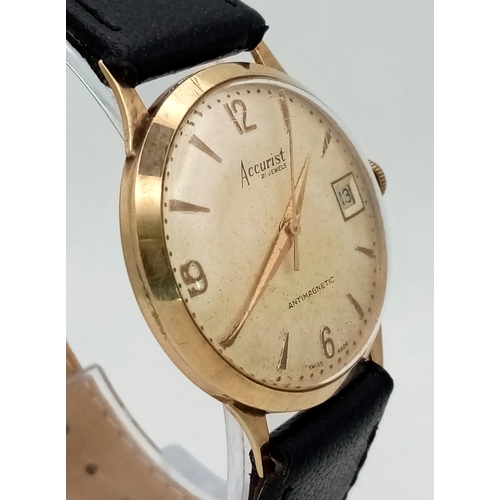 683 - A Vintage Accurist 9K Gents Gold Watch. Black leather strap. 9K gold case - 32mm. Mechanical movemen... 