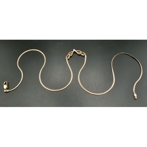 604 - A 9K Yellow Gold Herringbone Necklace with a Diamond Drop Attachment. Six small diamonds amidst tear... 