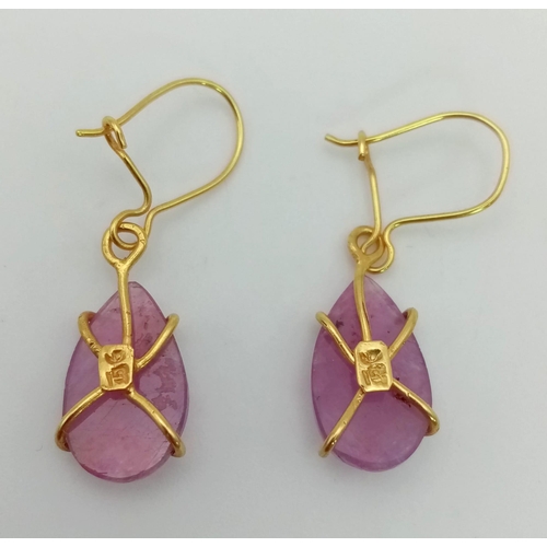 1379 - A Pair of 9K Yellow Gold and Ruby Teardrop Earrings. 2g total weight.