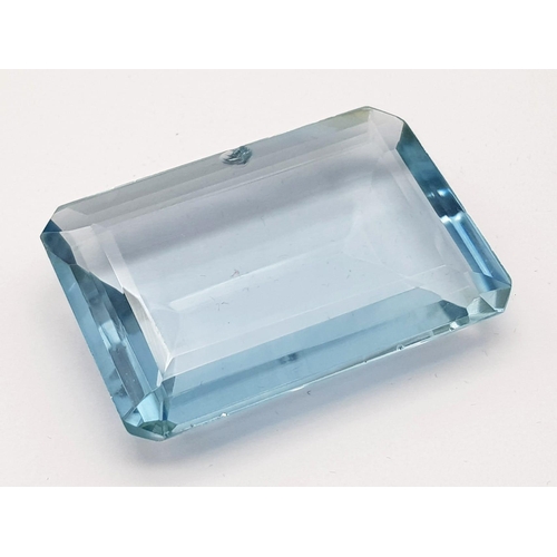 1400 - 117.25 Ct Faceted Blue Topaz. Rectangular Cut. Comes with GLI Certificate.