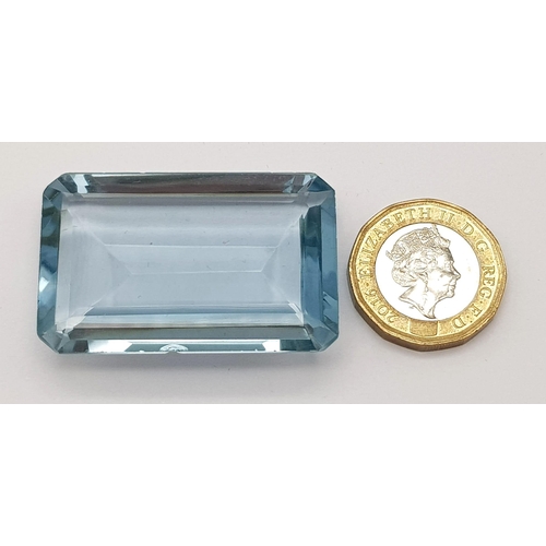 1400 - 117.25 Ct Faceted Blue Topaz. Rectangular Cut. Comes with GLI Certificate.