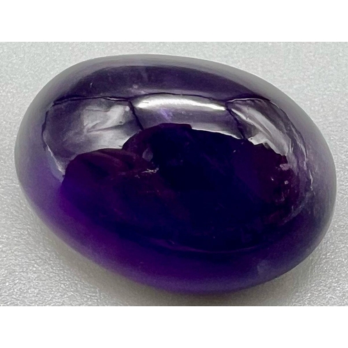 1407 - 32.30 Ct Natural Amethyst. Purple. Oval Cabochon. Comes with GLI Certificate.