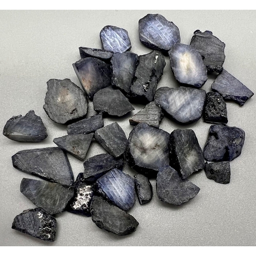 1240 - 303.55 Ct Rough Blue Sapphire Lot.