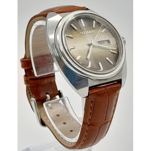 1245 - A Vintage Citizen Automatic Gents Watch. Brown leather strap. Stainless steel case - 37mm. Silver-Br... 