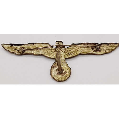 1291 - A Repro WW2 German Eagle Tunic Badge. 9cm