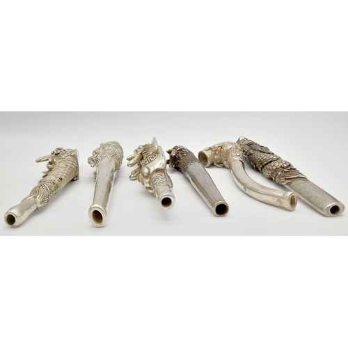 147 - A very collectible group of six antique, Chinese silver dragon smoking pipes, presented in a wonderf... 