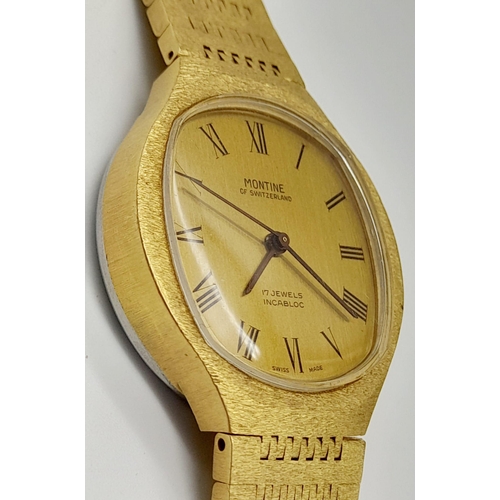 700 - A Vintage Montine of Switzerland Gold Plated Gents Watch. Case - 33cm. Gold tone dial. Automatic mov... 