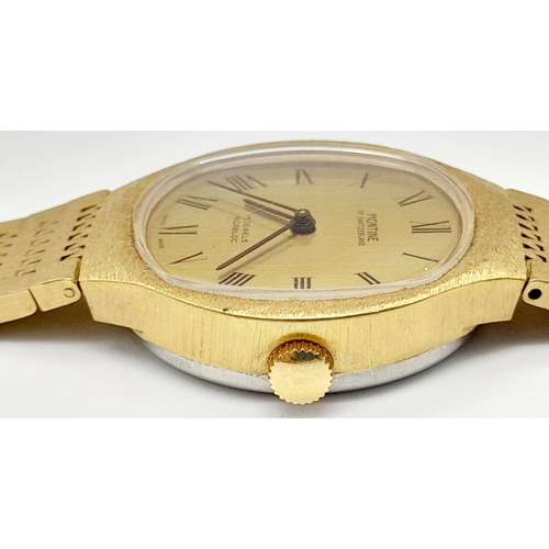 700 - A Vintage Montine of Switzerland Gold Plated Gents Watch. Case - 33cm. Gold tone dial. Automatic mov... 