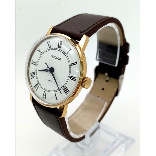 1259 - A Vintage Sekonda 19 Jewel Russian Gents Watch. Burgundy leather strap. Two tone steel case - 34mm. ... 