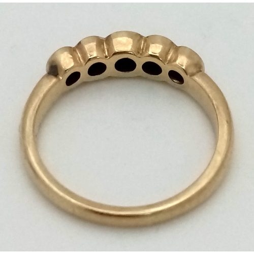 394 - A 9K Yellow Gold Five Diamond Ring. 0.20ct. Size N. 2.96g total weight.