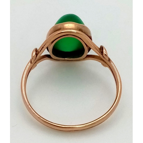 653 - A Vintage 18K Rose Gold (tested) Jade Ring. Size O. 3.42g total weight.