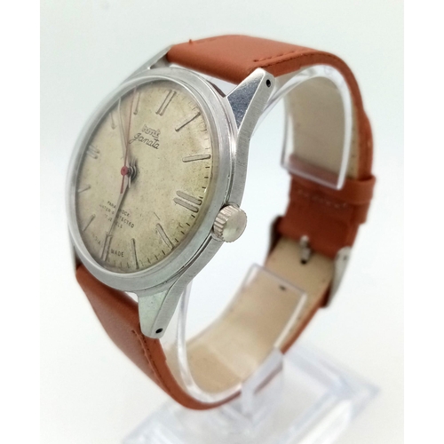 882 - A Vintage HMT Janata 17 Jewel Parashock Gents Watch. Brown leather strap. Stainless steel case - 35m... 