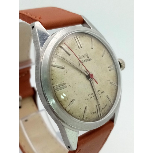 882 - A Vintage HMT Janata 17 Jewel Parashock Gents Watch. Brown leather strap. Stainless steel case - 35m... 